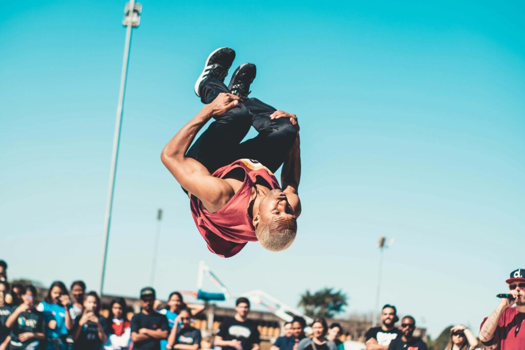Male dancer doing a back flip