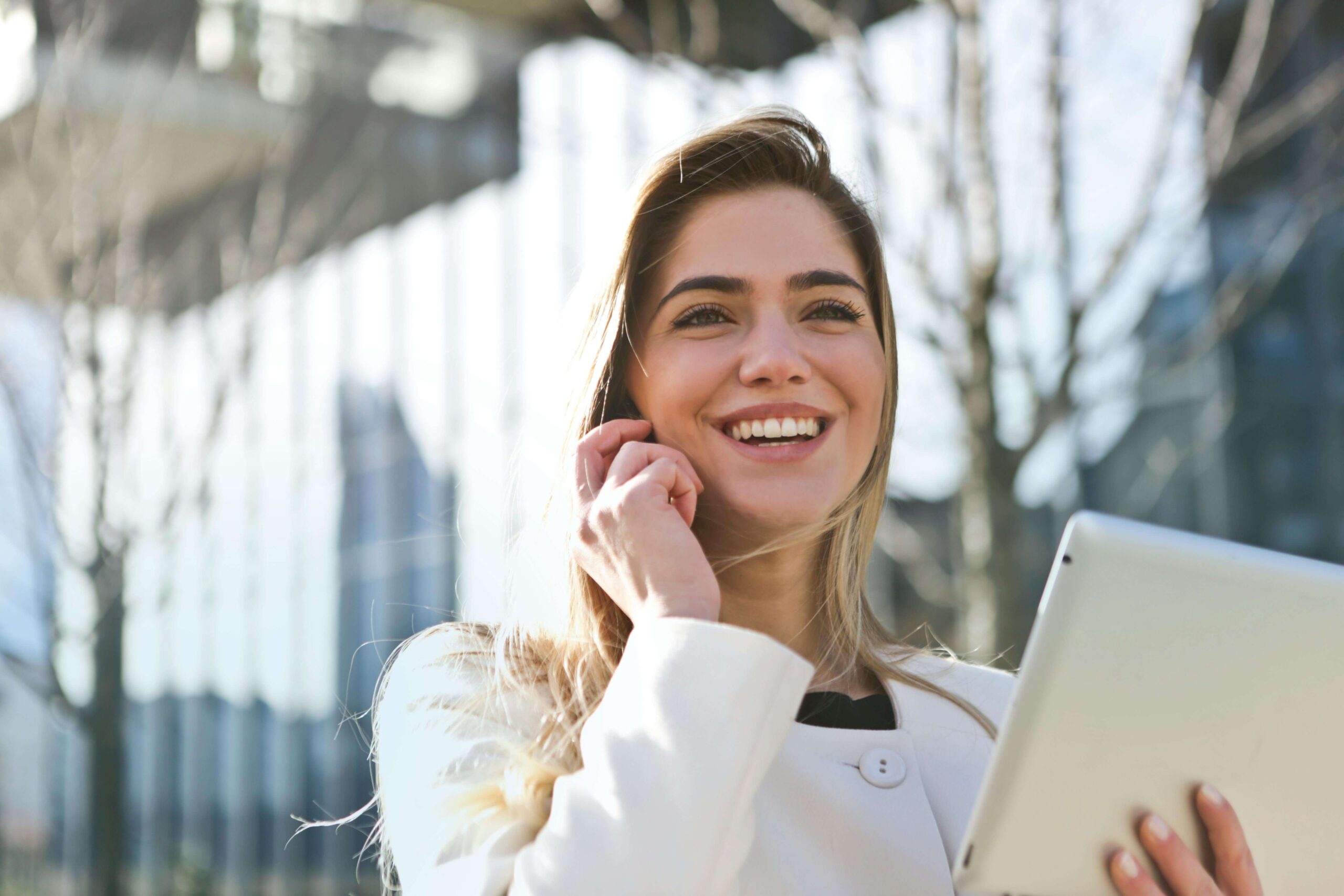 Business owner talking to her supplier on the phone