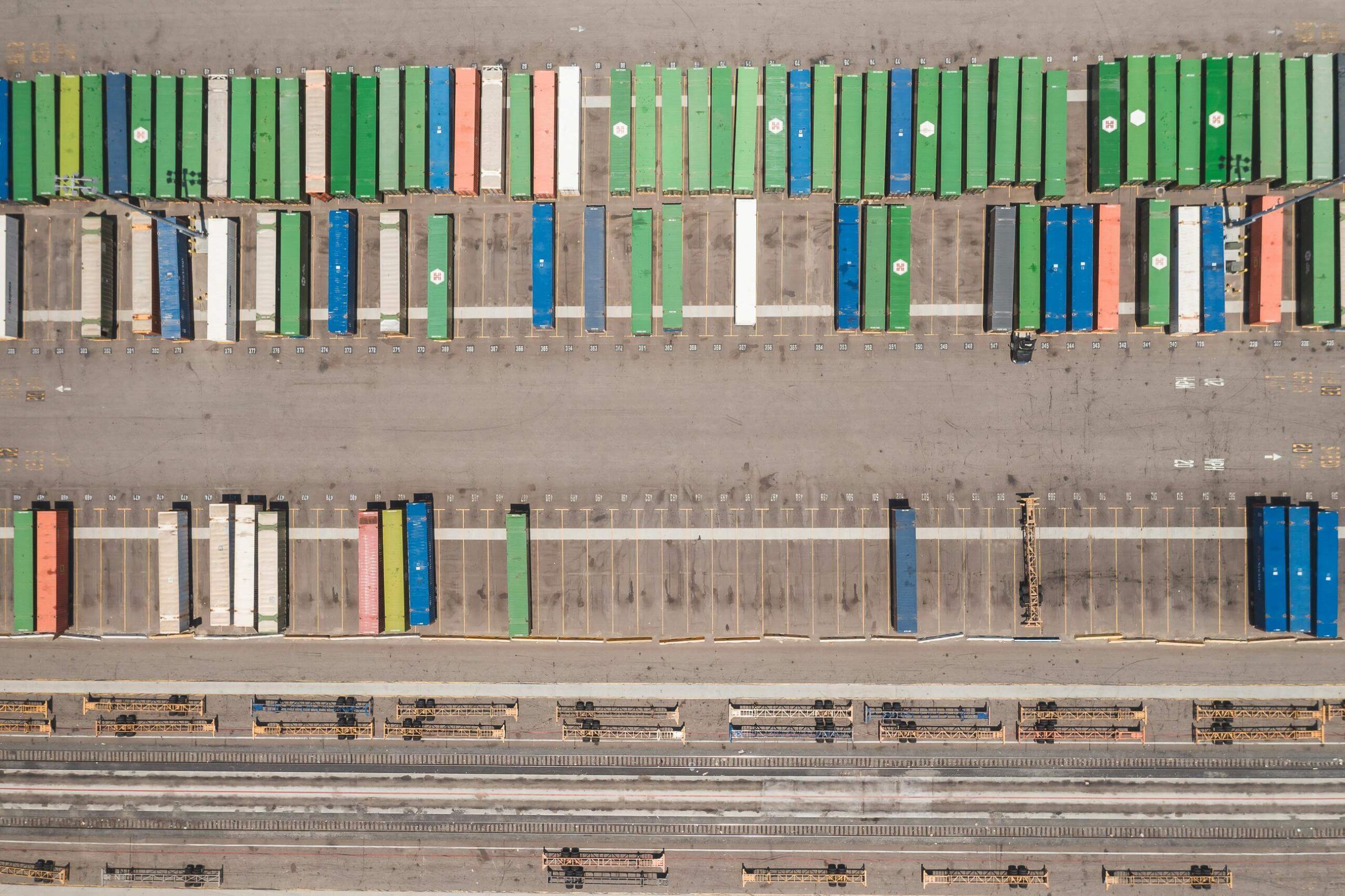 Shipping containers in a parking lot ready to be picked up by truckers