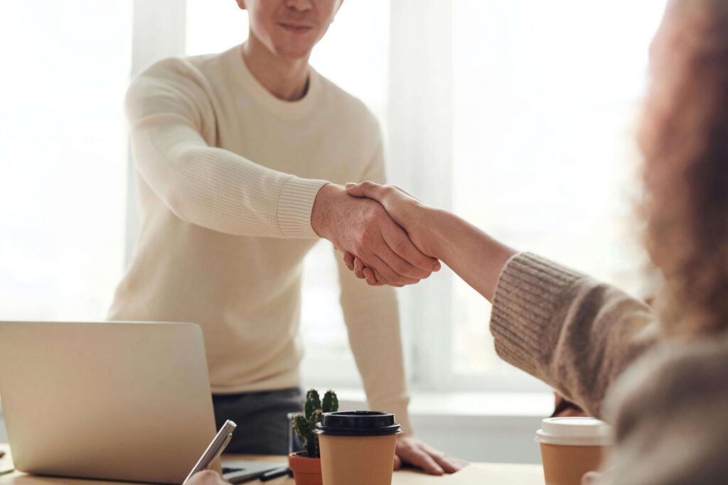 two business owners shaking hands