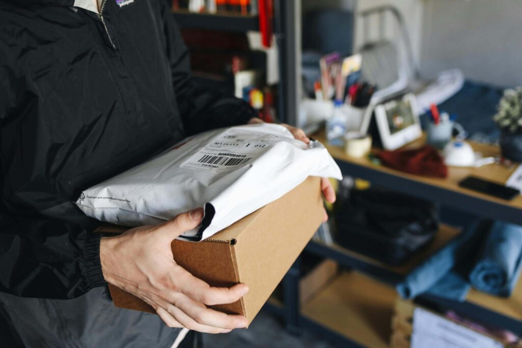 Delivery man carrying a package