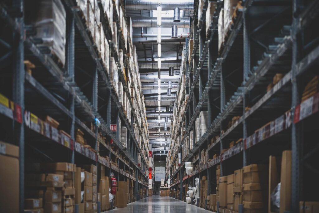 warehouse with tall racks and ceiling