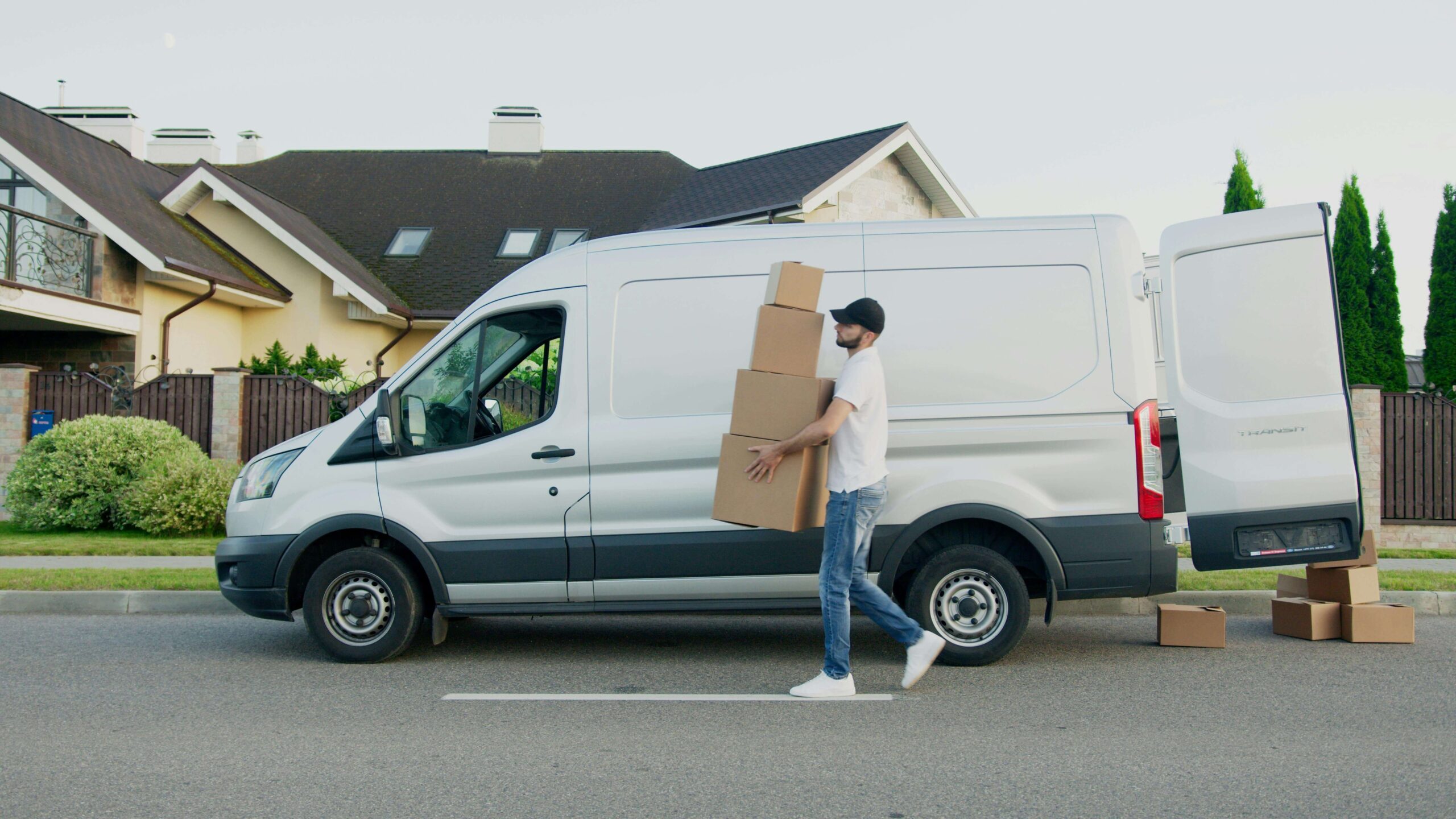 courier service delivering a package to a neighborhood