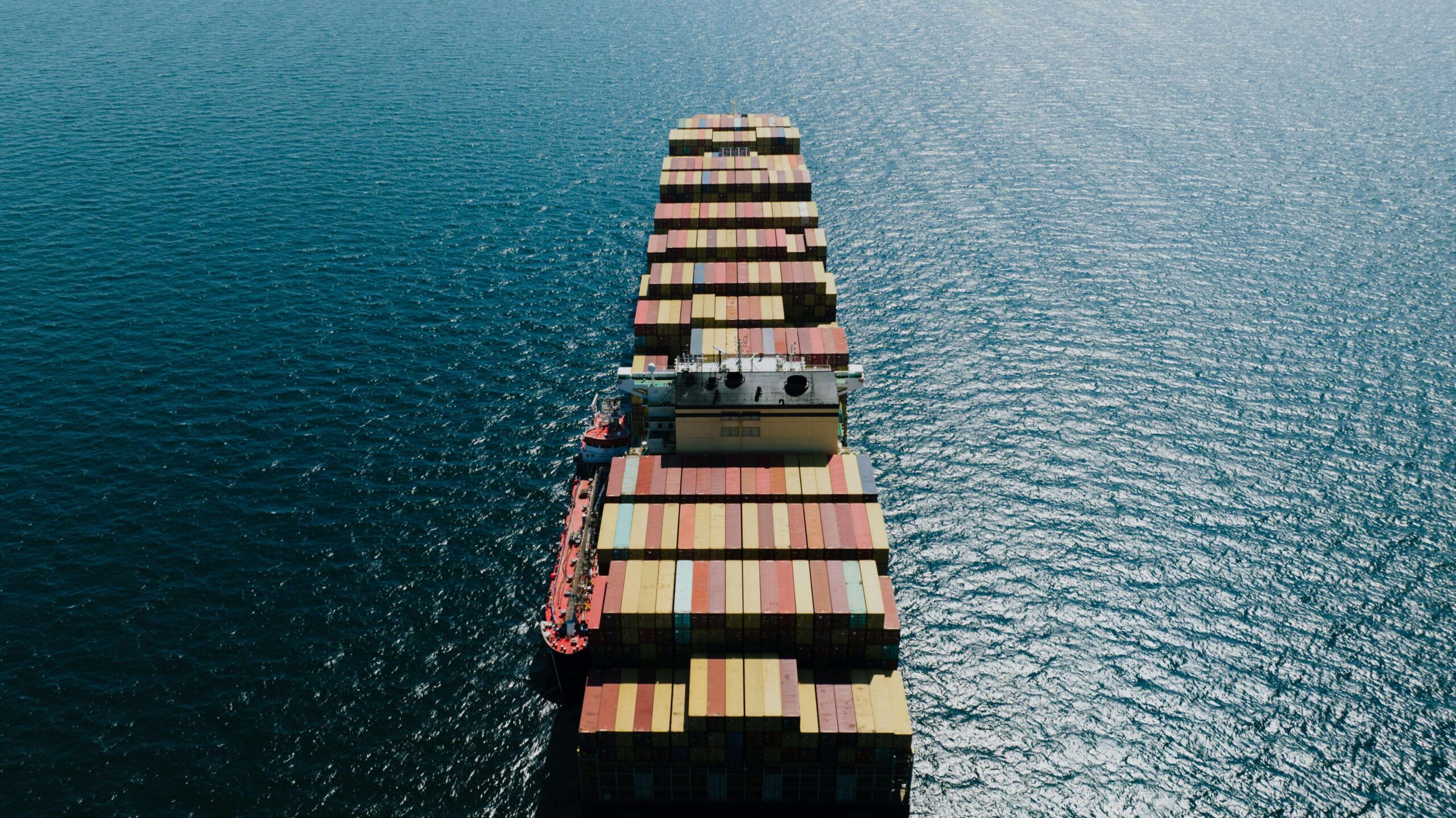 shipping containers on a carrier delivering internationally