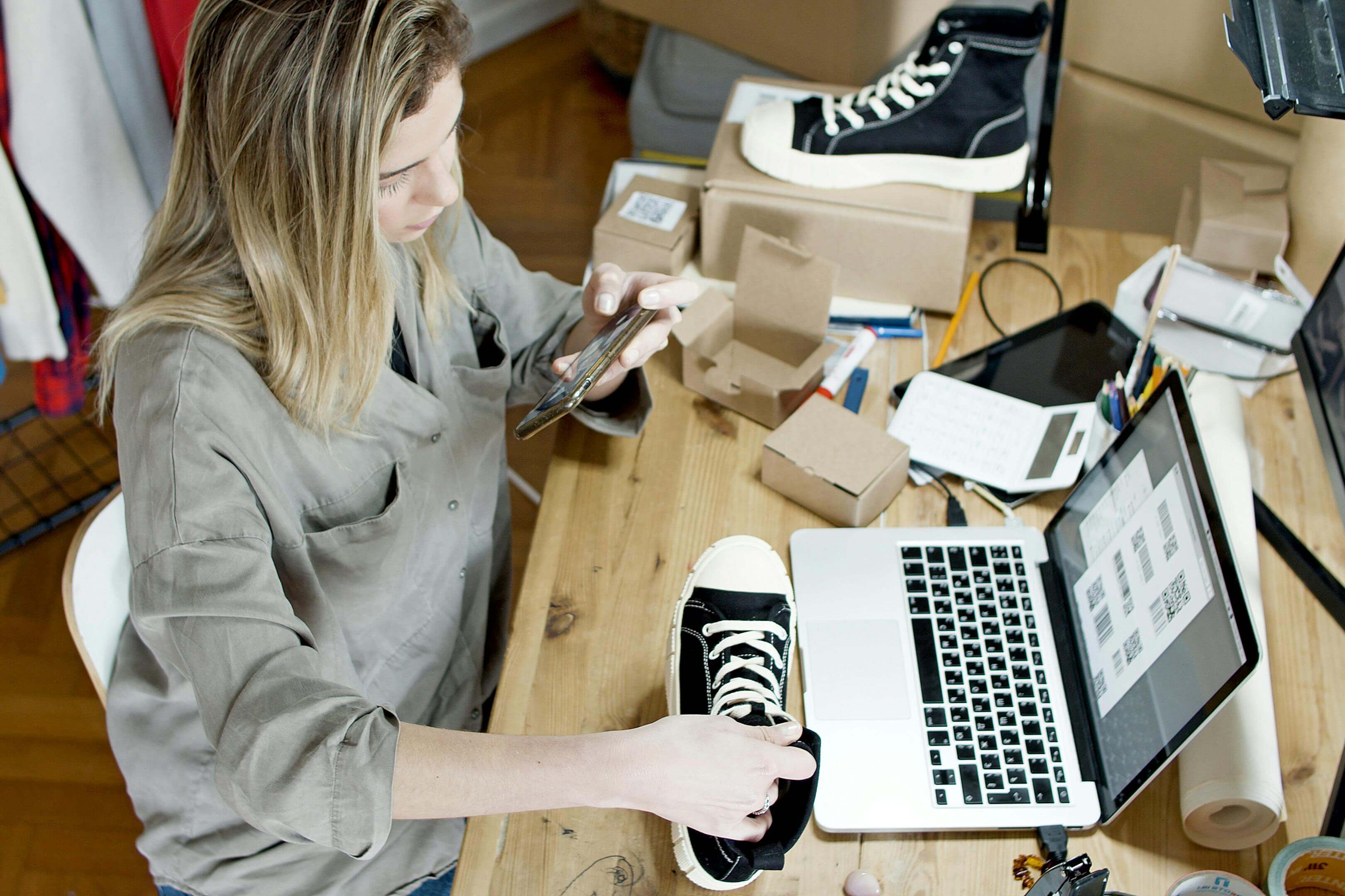 a small shop owner listing a product online