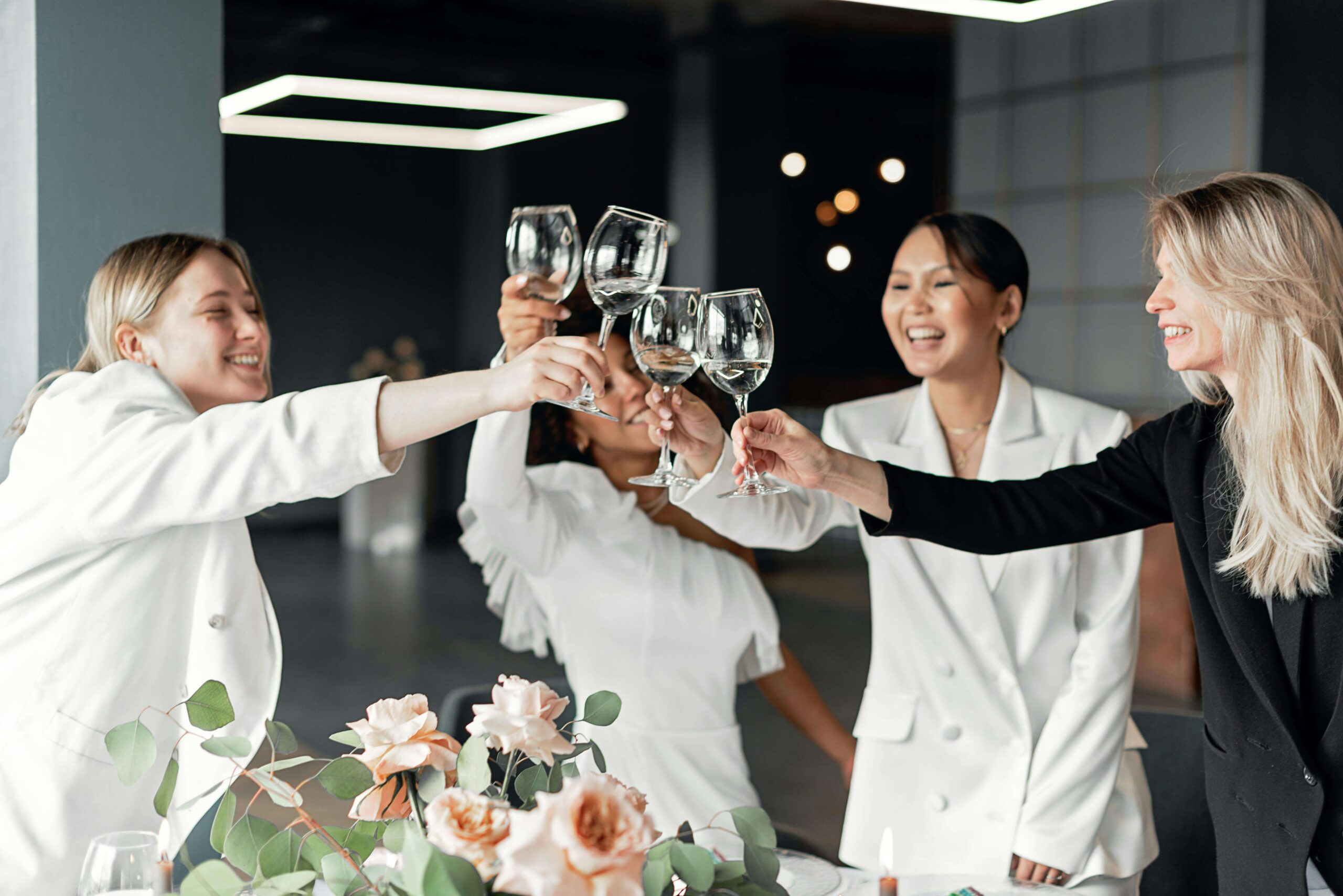 owner and employees celebrating the success of an online store
