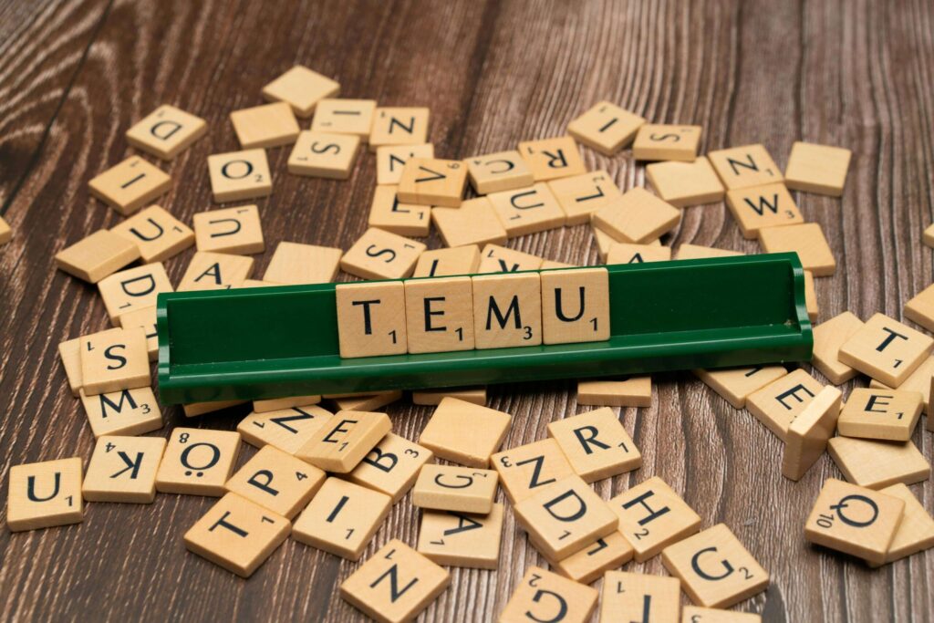 scrabble tiles forming the word Temu