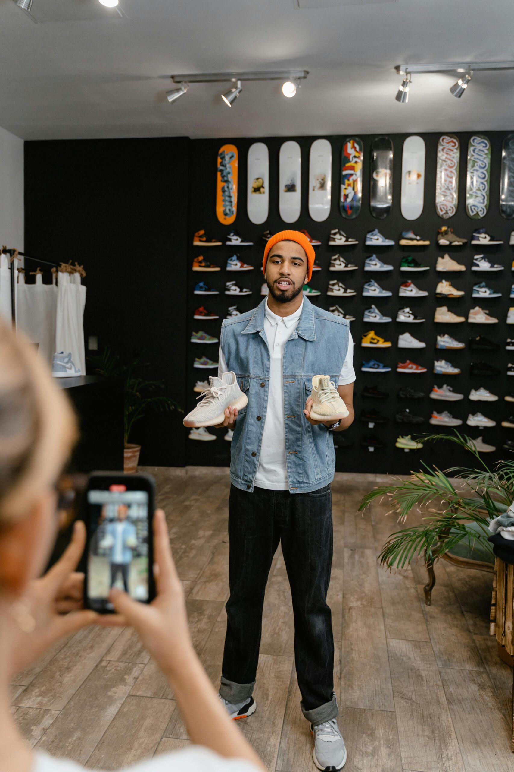 affiliate marketer recording a video to sell shoes