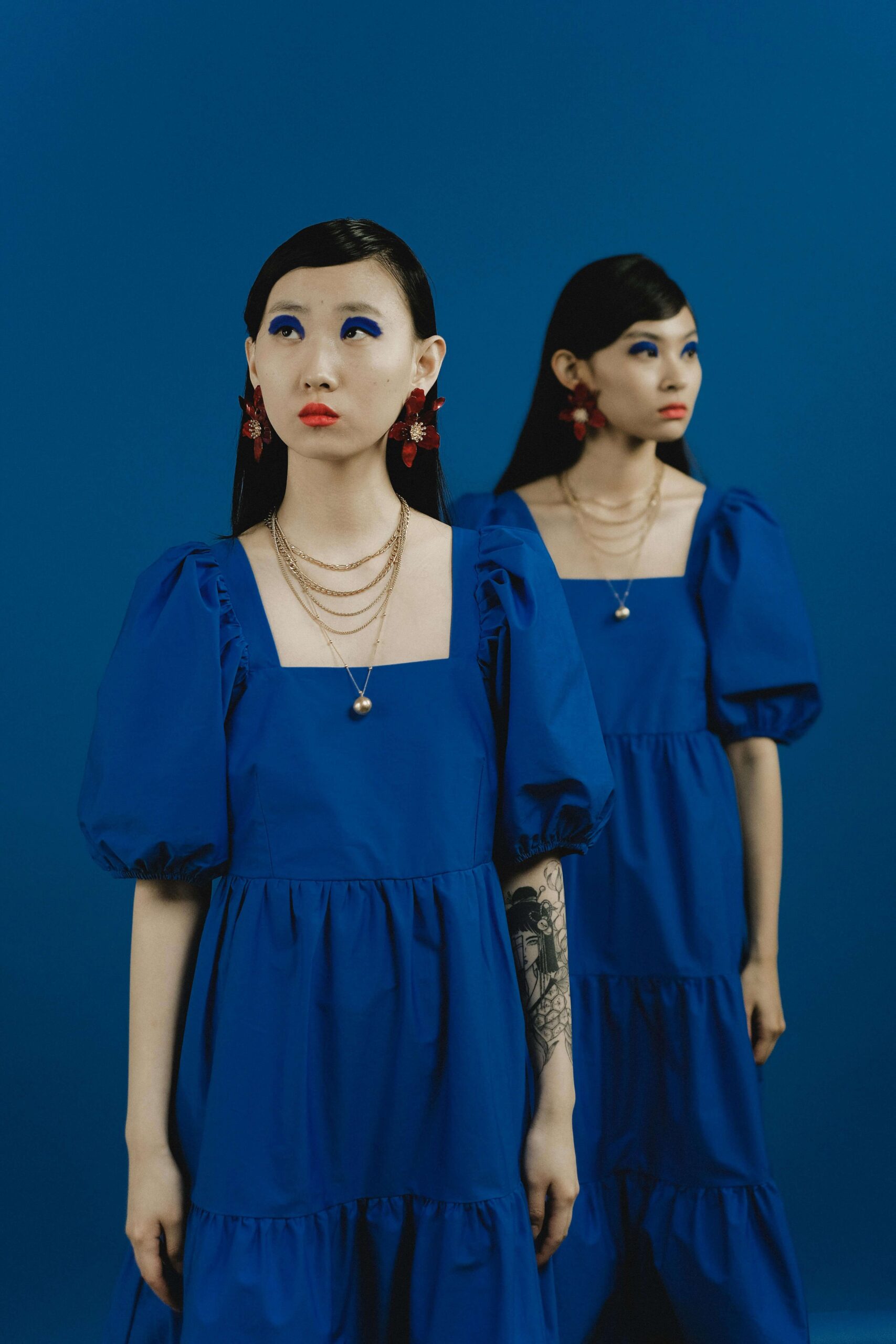 Two women in exactly the same getup