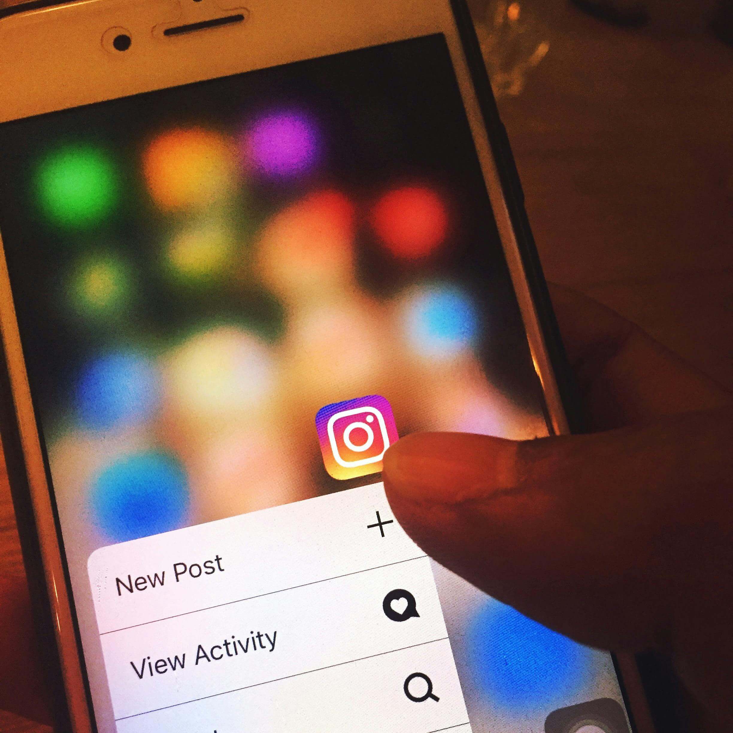 online seller opening Instagram on their phone